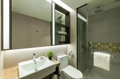 a bathroom with a sink and a toilet and a shower at Citadines Prai Penang in Bukit Mertajam