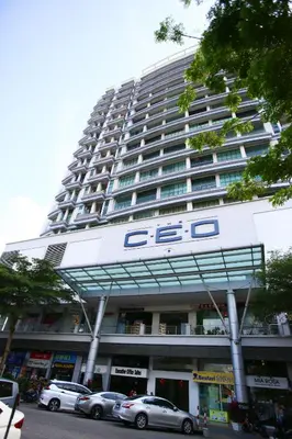 a large building with cars parked in front of it at Private Beanie (Private Cinema, Swing & more) at CEO Penang in Bayan Lepas