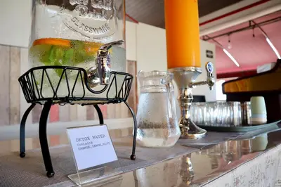 a display of glass vases on a shelf at Armenian Street Heritage Hotel in George Town