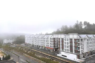 an aerial view of a large apartment building at W58 WarmStay atGoldenHill NightMarket 2R WiFi CarPark in Tanah Rata