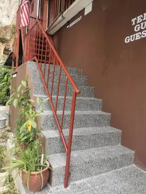 a set of stairs leading up to a building at Homestay Teduhan Gunung, Gopeng in Gopeng