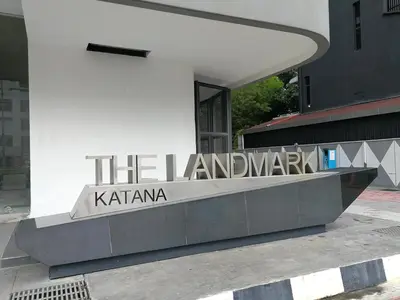 a sign on the side of a building at Landmark Stunning High Floor Coast View Studio #Netflix #Fast Wifi in Tanjong Tokong