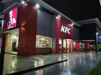 a kfc store at night with its lights on at Landmark Stunning High Floor Coast View Studio #Netflix #Fast Wifi in Tanjong Tokong