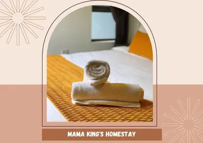 a picture of a towel sitting on a bed at Mama King’s Homestay@ Palas Horizon in Brinchang