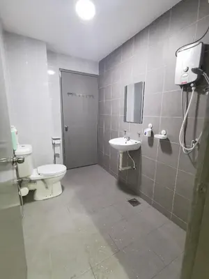 a bathroom with a toilet and a sink at Coco HomeStay \u65c5\u4eba\u306e\u5bb6@The Venus Sitiawan Perak in Sitiawan