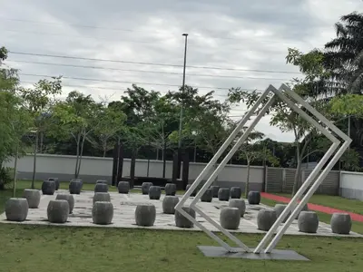 a sculpture in a park with stone spheres at Coco HomeStay \u65c5\u4eba\u306e\u5bb6@The Venus Sitiawan Perak in Sitiawan