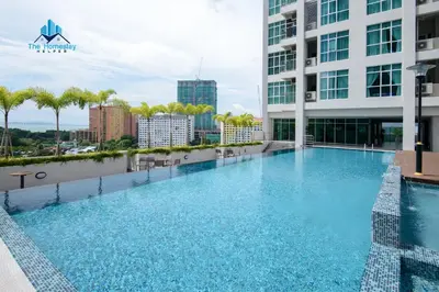 a large swimming pool on the roof of a building at Straits Garden Suites by The Homestay Helper in George Town
