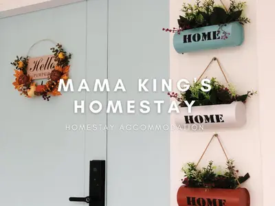 a sign that reads mama kings homesay hanging plants at Mama King's Homestay @ Marina Island in Kampong Batu Gajah