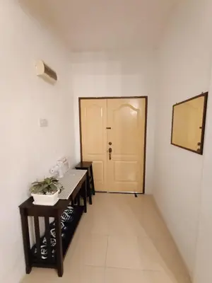 an empty room with a table and a door at Dream 1 in Cameron Highlands
