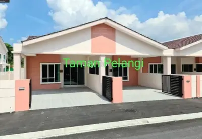 a house with a sign in front of it at QC Homestay - Room Only in Pusing