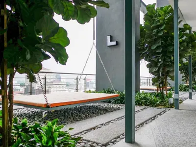 a swing hanging from the side of a building at Tropicana 218 Macalister Seaview Water Purifier Studio in George Town