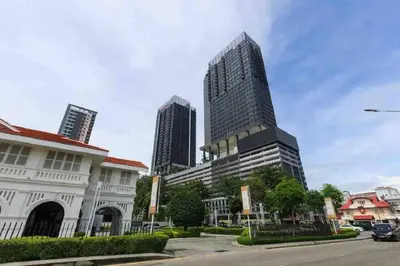 a tall building in the middle of a city at Tropicana 218 Macalister Seaview Water Purifier Studio in George Town