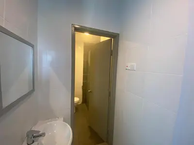a bathroom with a sink and a mirror at GUNONG HOMESTAY at Golden Hills CameronHighlands in Cameron Highlands