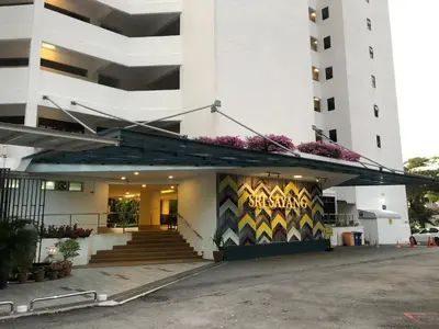 a building with a mural on the front of it at Beach Resort 7 Home Stay SRI SAYANG APARTMENT BATU FERRINGHI 3BEDROOM in Batu Ferringhi