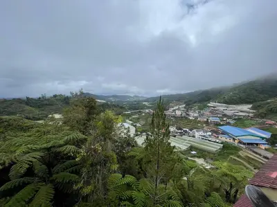 an aerial view of a town in a mountain at EquatorialHillResort SunsetView 10Min Popular FARM in Brinchang