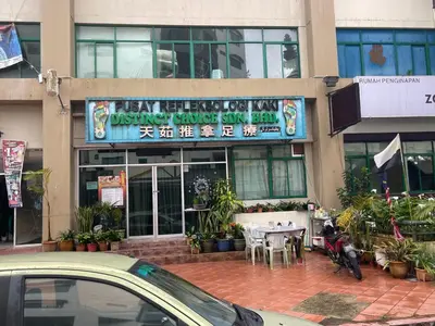 a restaurant with a sign on the front of a building at EquatorialHillResort SunsetView 10Min Popular FARM in Brinchang