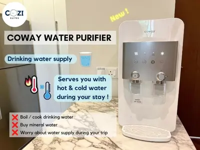 a water purifier sitting on top of a counter at Instagramable Luxury Suites for Couples or Families • Straits Quay Penang • Sea View Balcony • Private Bathtub in Bagan Jermal