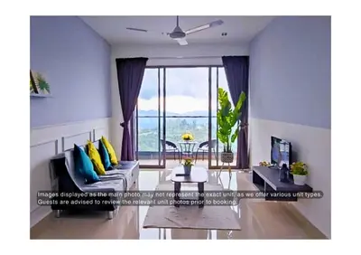 a living room with a couch and a large window at PLAY at Palas Horizon @ Kea Farm in Cameron Highlands