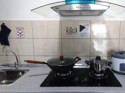 a frying pan on a stove in a kitchen at PLAY at Palas Horizon @ Kea Farm in Cameron Highlands