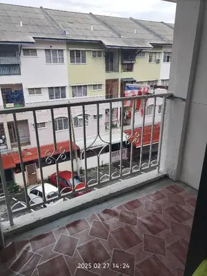 a balcony with a view of a building at Budget Homestay Impiana Adril in Ipoh