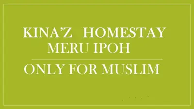 a green sign with the words kimz homesay neu pol only for at Kinaz homestay in Ipoh
