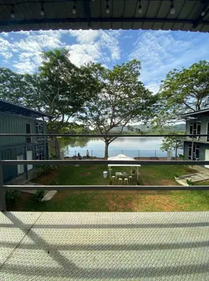 a view from the balcony of a house with a picnic table at 1108 Carebin Slim River in Slim River