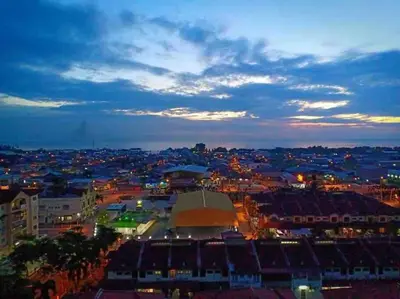 a view of a city at night at Shuang Yang Sekinchan Homestay 3 in Sekincan