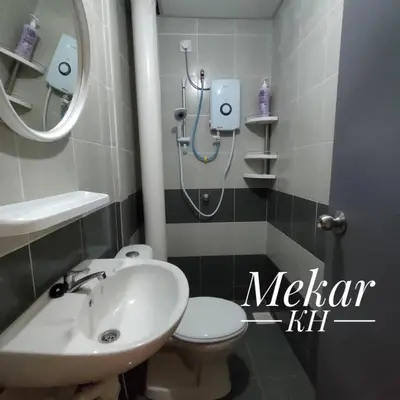a bathroom with a sink and a toilet and a shower at Mekar KH Homestay (Muslim) @ Brinchang in Brinchang