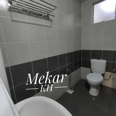 a bathroom with a white toilet and a sink at Mekar KH Homestay (Muslim) @ Brinchang in Brinchang