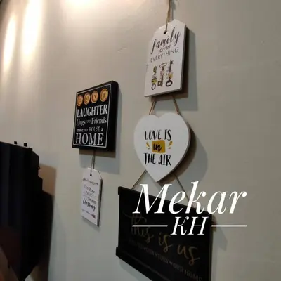 a wall with signs and a clock on a wall at Mekar KH Homestay (Muslim) @ Brinchang in Brinchang