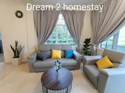 a living room with a couch and a table at Dream 2 in Cameron Highlands