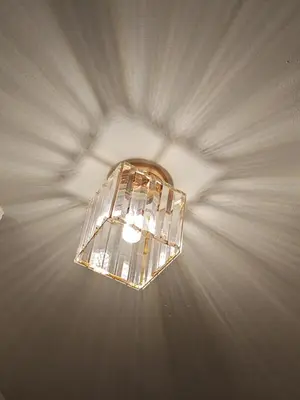 a light hanging from a ceiling in a room at Cozy Suite for 2-6 pax near Kek Lok Si, Penang Hill, Sunshine Central in Ayer Itam