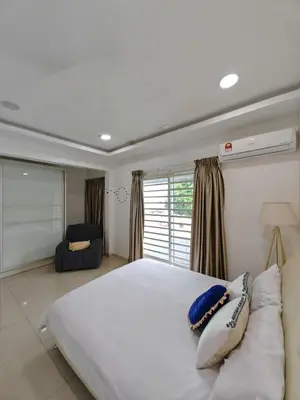 a large white bed in a room with a window at Cozy Suite for 2-6 pax near Kek Lok Si, Penang Hill, Sunshine Central in Ayer Itam