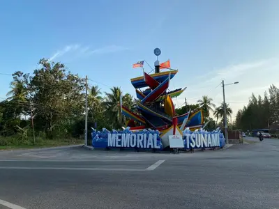 a large sculpture on the side of a road at An-Nur Homestay in Sungai Petani