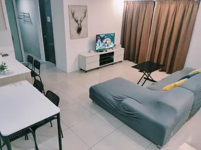 a living room with a couch and a tv in it at Dual Key 3BR at Macalister 218 Georgetown 32 WL in George Town