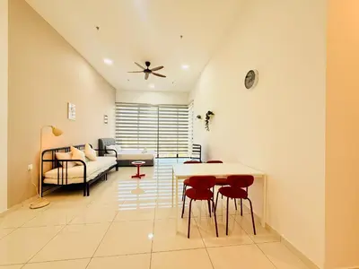 a living room with a table and chairs and a couch at N New Georgetown Instagramable 2BR Homestay for 10pax \u65e0\u654c\u7f8e\u666f\u4e24\u623f\u6c11\u5bbf Beacon Executive Suite in George Town