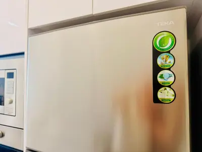 a refrigerator with a bunch of stickers on it at N New Georgetown Instagramable 2BR Homestay for 10pax \u65e0\u654c\u7f8e\u666f\u4e24\u623f\u6c11\u5bbf Beacon Executive Suite in George Town