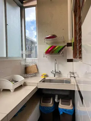 a kitchen with a sink and a window at Jarzmin Double Story Homestay @ Royal Lily in Tanah Rata