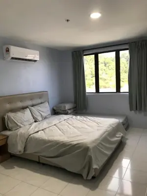 a bedroom with a bed and a large window at Pangkor Coralbay Resort Room 208 apartment in Pangkor