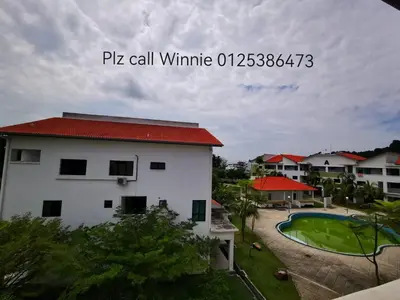 a view of a building and a swimming pool at Happy homestay pulau pangkor in Kampong Sungai Udang