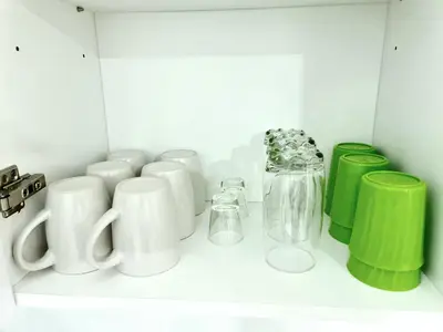 a room with a bunch of vases and jars at Beacon Executive Suites in George Town