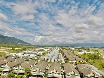 an aerial view of a city with houses at Ammar SkyHome Ipoh in Ipoh
