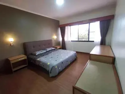 a small bedroom with a bed and a window at Cozy Home Copthorne Equatorial Hill Resort in Brinchang