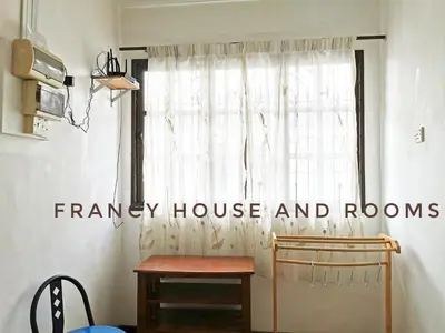 a window with the words fancy house and rooms written on it at Chill and Traditional House in Bercham Ipoh in Ipoh
