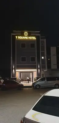 a square hotel with cars parked outside at night at T SQUARE HOTEL (IPOH) in Ipoh