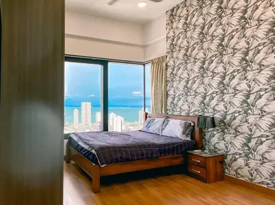 a bedroom with a bed with a large window at Homestay at Macalister 218 Georgetown by WL in George Town