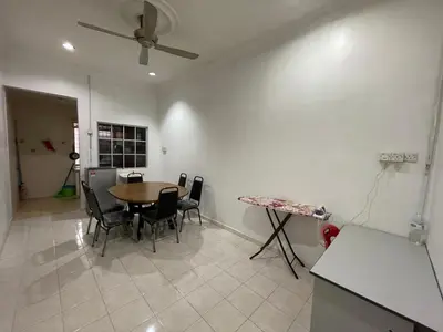 a kitchen and dining room with a table and chairs at Homestay Bidor DMaju in Bidur