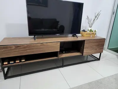 a entertainment center with a flat screen tv on top at SCANDI HOMESTAY IPOH muslem in Ipoh
