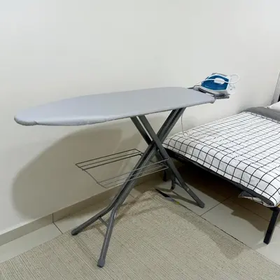 a desk sitting next to a bed in a room at SCANDI HOMESTAY IPOH muslem in Ipoh