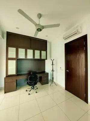 a room with a desk and a chair and a ceiling fan at ●STG12●3-Storey●Private House●2step Access Garden● in Bayan Lepas